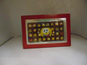 Smiley in melkchocolade in geschenkdoos